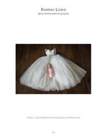 newborn baby swaddled on wedding gown portrait photography