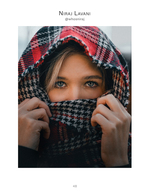 woman wrapped in plaid scarf portrait photography