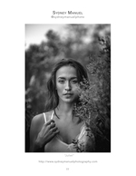 woman in white lace top among wildflowers portrait photography