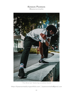 man in windup pitching pose street portrait photography