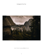 mountain cabin below cloud-covered peaks landscape photography