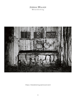 weathered warehouse wall covered in graffiti urban photography