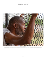 man gripping a chain-link fence at a softball game event photography