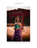 woman in emerald and purple gown in a golden field fashion photography