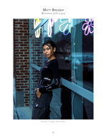 woman posing against a neon flower backdrop street fashion photography