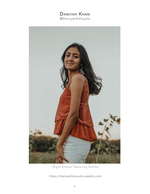 woman in rust velvet top windswept portrait photography