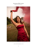 woman in red gown with tiara holding red smoke grenade senior portrait photography