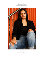 woman in black blazer on orange staircase portrait photography