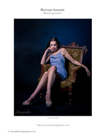 woman in blue dress on vintage armchair portrait photography