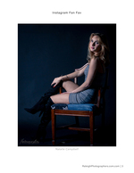 woman in over-the-knee boots seated portrait photography