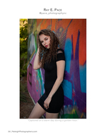 woman in black dress against graffiti wall portrait photography