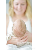 newborn's head cradled in mother's hands newborn photography