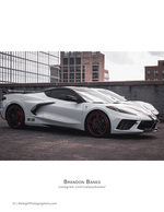 white sports car parked on a rooftop automotive photography