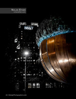 bronze acorn sculpture lit up at night cityscape photography
