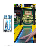 model's feet resting on an arcade skee-ball lane fashion photography