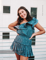 smiling woman in a sparkly teal dress senior portrait photography