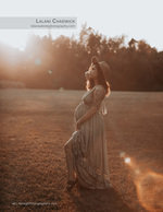 pregnant woman in a wide-brim hat in a golden field maternity photography