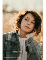 backlit curly-haired woman in denim jacket portrait photography