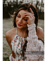 windswept woman in floral dress portrait photography