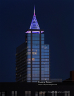 illuminated PNC Plaza tower at night cityscape photography