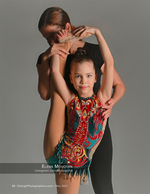 young rhythmic gymnast in costume with her coach sports photography