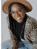 woman in leopard print blazer and hat senior portrait photography