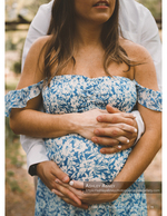 couple's hands cradling a pregnant belly maternity photography