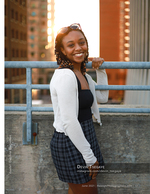 woman smiling on a rooftop at sunset portrait photography