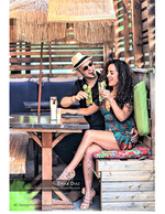 couple toasting cocktails at a tiki bar portrait photography