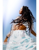 woman with braids blowing in the wind fashion photography
