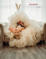 bride reclined on a couch with a bouquet back cover wedding photography