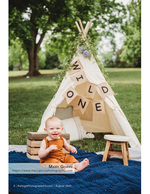 baby's first birthday session with a teepee backdrop portrait photography