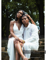 couple seated together on stone steps portrait photography