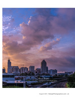 storm clouds over the downtown skyline at dusk cityscape photography