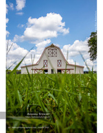 white barn shot from a low angle through the grass rustic photography