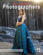woman in a teal floral gown before a waterfall cover fashion photography