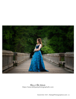 woman in a blue gown on a wooden boardwalk portrait photography