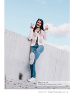 woman giving peace signs on a rooftop portrait photography