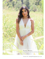 woman in a flowing white dress in a meadow portrait photography