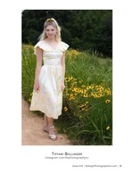woman in a vintage floral dress beside black-eyed susans portrait photography