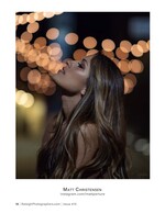 woman in profile beneath string light bokeh at night portrait photography