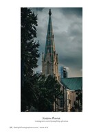green-roofed church steeple rising above the downtown skyline cityscape photography