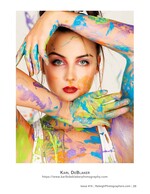woman covered in colorful paint framing her face fine art beauty photography
