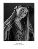 black and white portrait of a woman touching her hair fashion photography