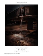 water splashing beneath a parking structure cityscape photography