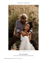 couple embracing in tall grass field couples photography