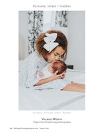 big sister kissing a newborn baby infant photography