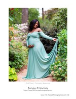 maternity portrait in sage green gown in a garden maternity photography