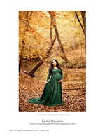 maternity portrait in a green gown by an autumn creek maternity photography