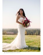 bride in fitted lace gown holding a burgundy bouquet bridal portrait photography